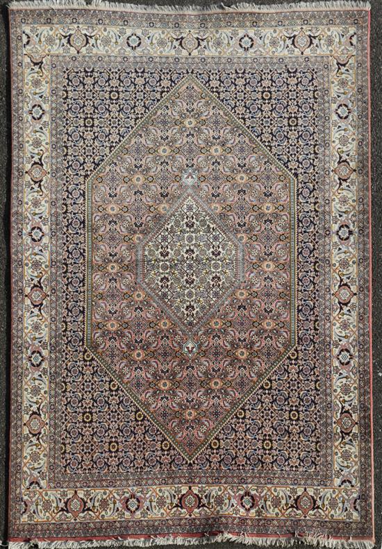 A modern Persian rug, 8ft by 5ft 7in.